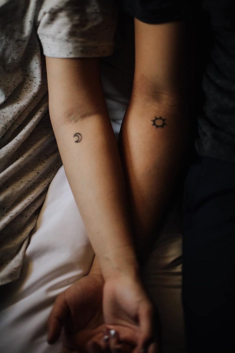 Pros of Small Tattoos couple love people man woman hands tattoo star moon1